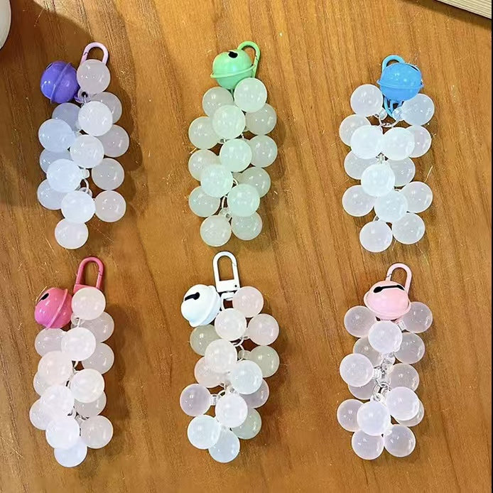 Six color options of UV color changing grape keychains