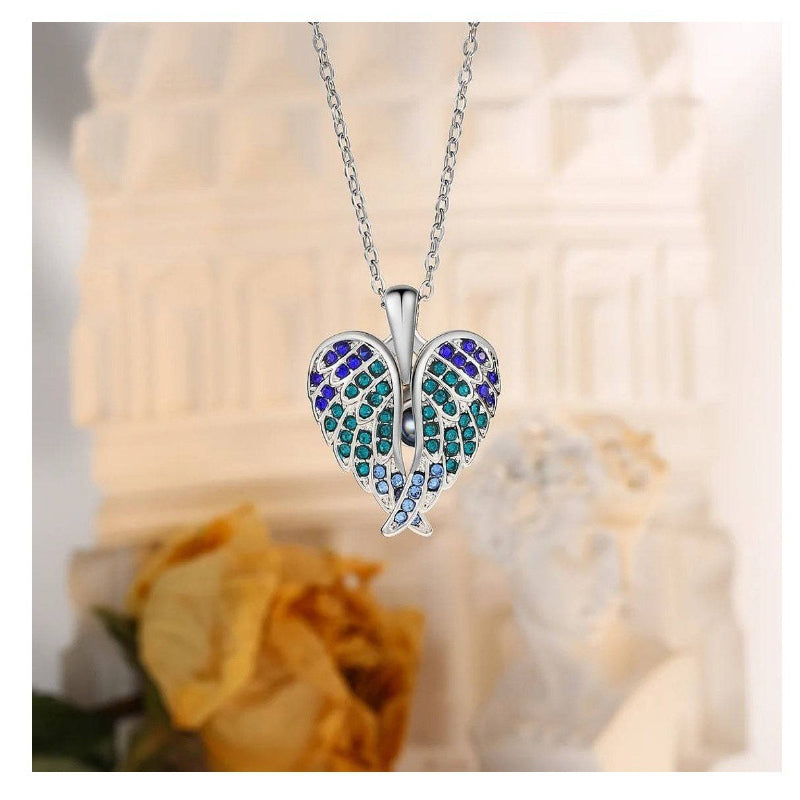 Angel wings heart necklace with sparkling crystal design
