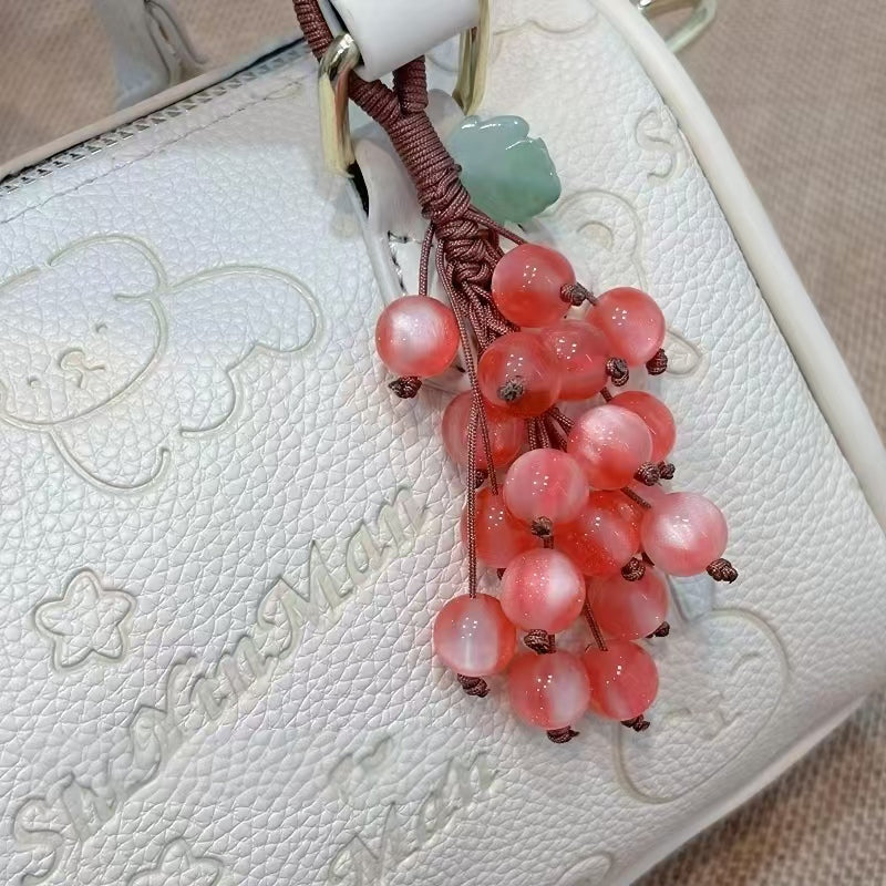 Handmade woven grape charm with color changing effect