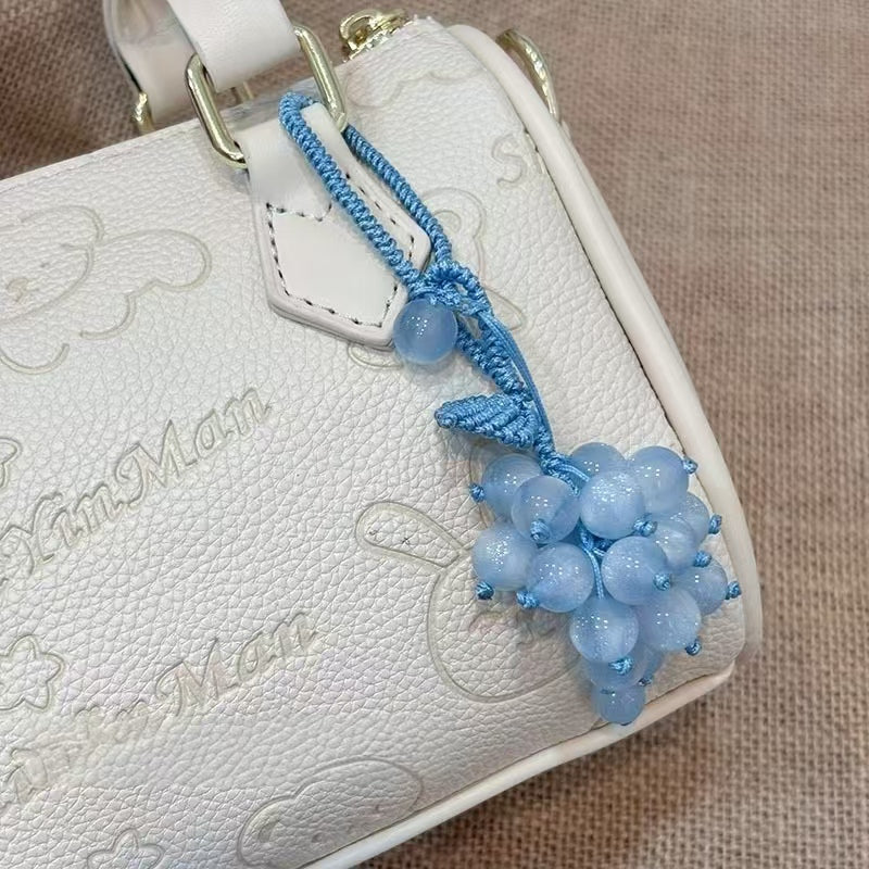 Handmade woven grape charm with color changing effect