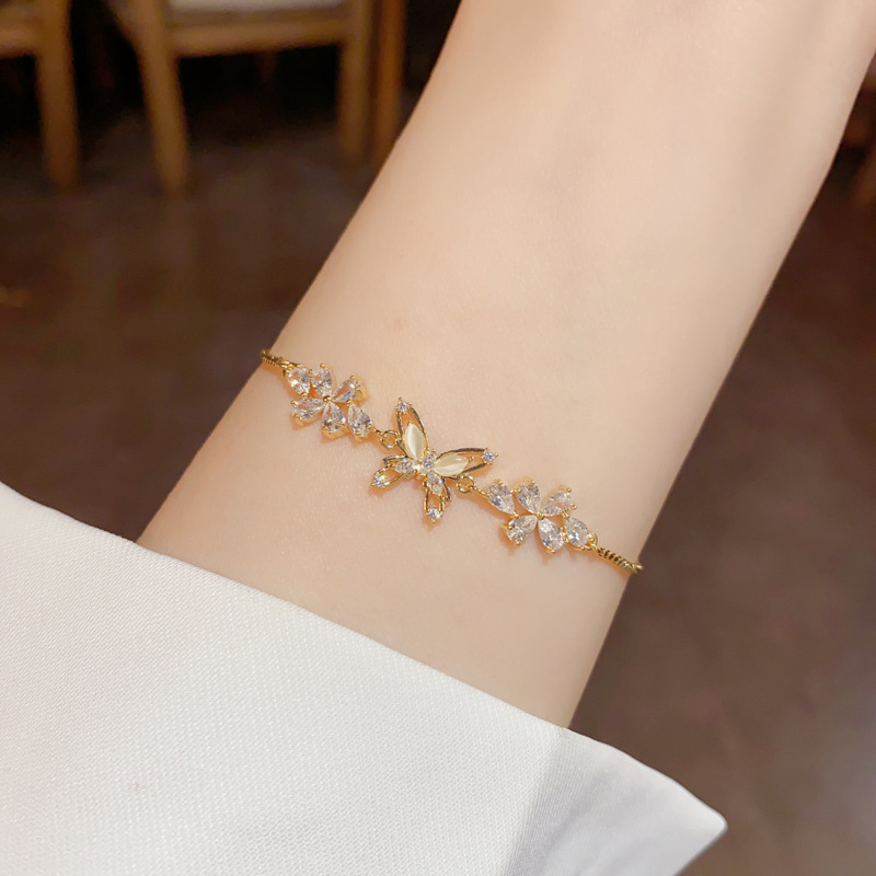 Adjustable butterfly pearl bracelet