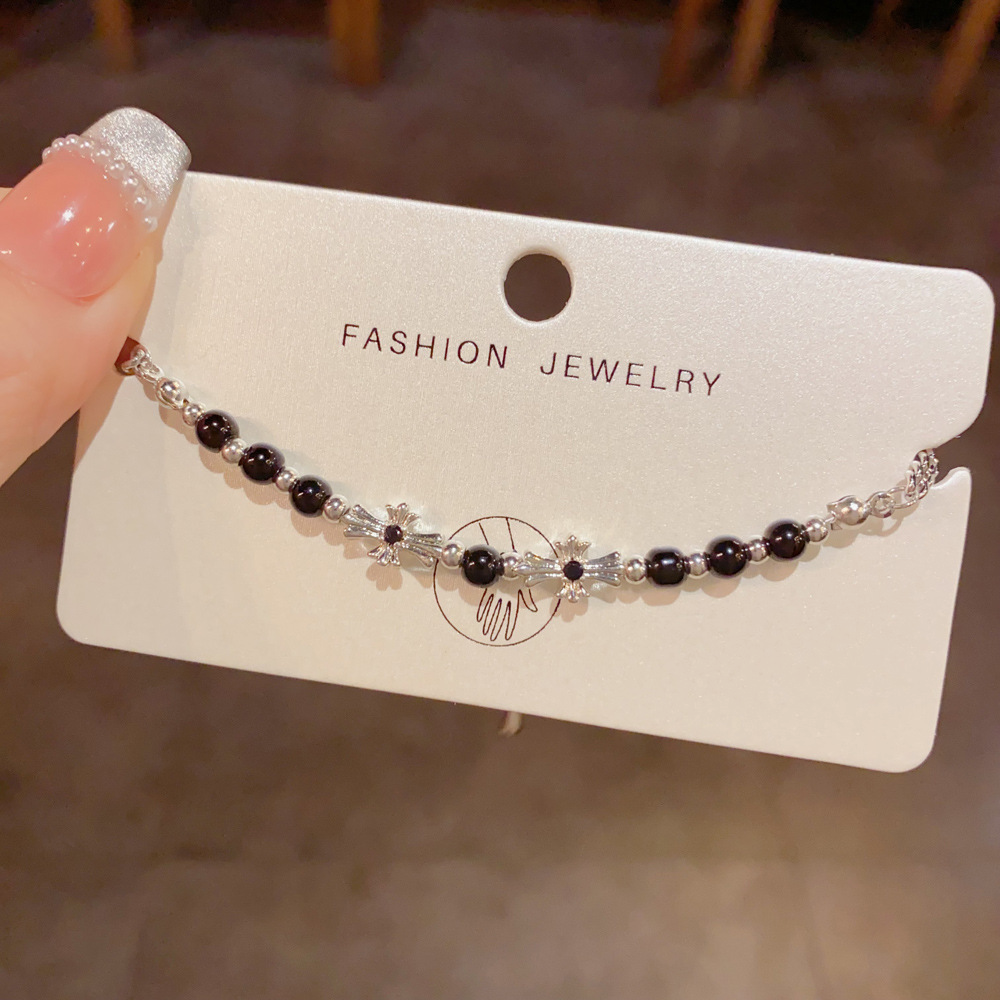 Silver-tone black bead bracelet