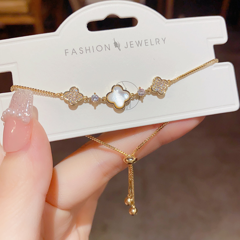 Adjustable gold clover bracelet