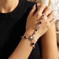 Five-pointedstar-shapedsunmoonlightstonelinkedfingerbraceletwearinganddisplay