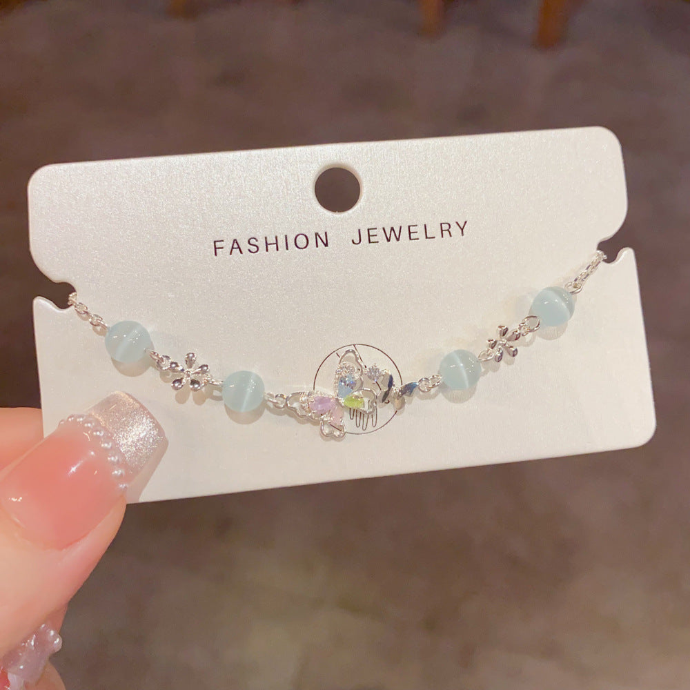 Colorful butterfly bracelet with mint green beads