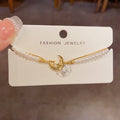 Pearl accents with butterfly and moon details