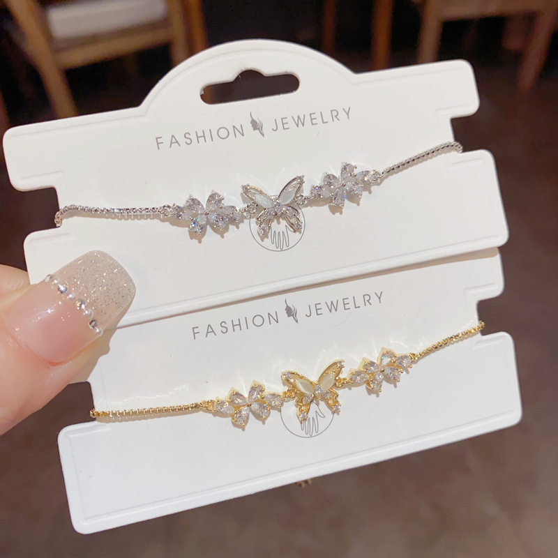 Gold and silver butterfly pearl bracelets