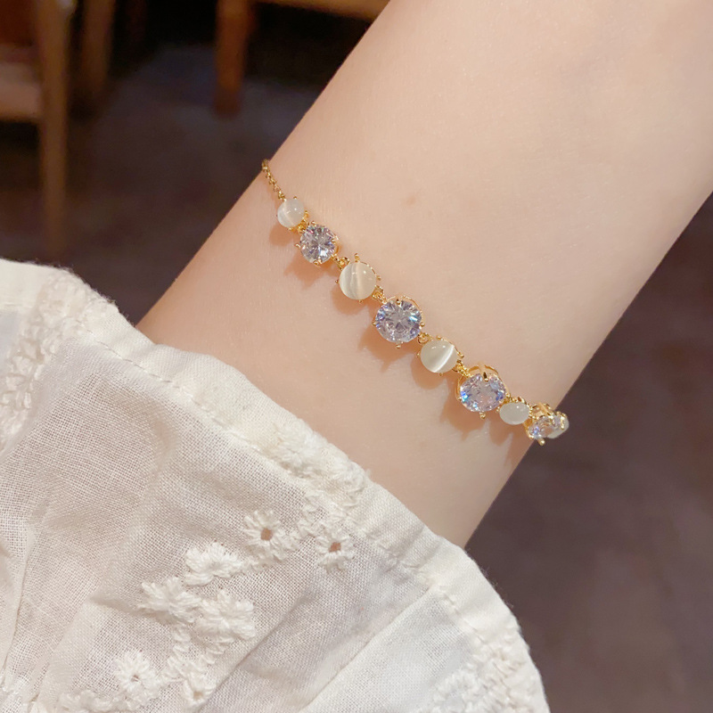 Gold cat's eye and zircon bracelet