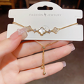 Gold clover slider bracelet for women