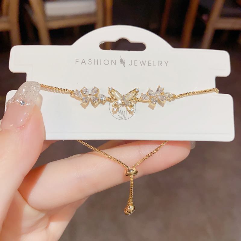 Silver-tone butterfly bracelet with pearls