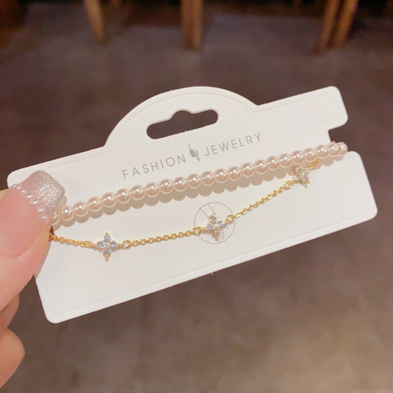 Gold plated pearl star bracelet