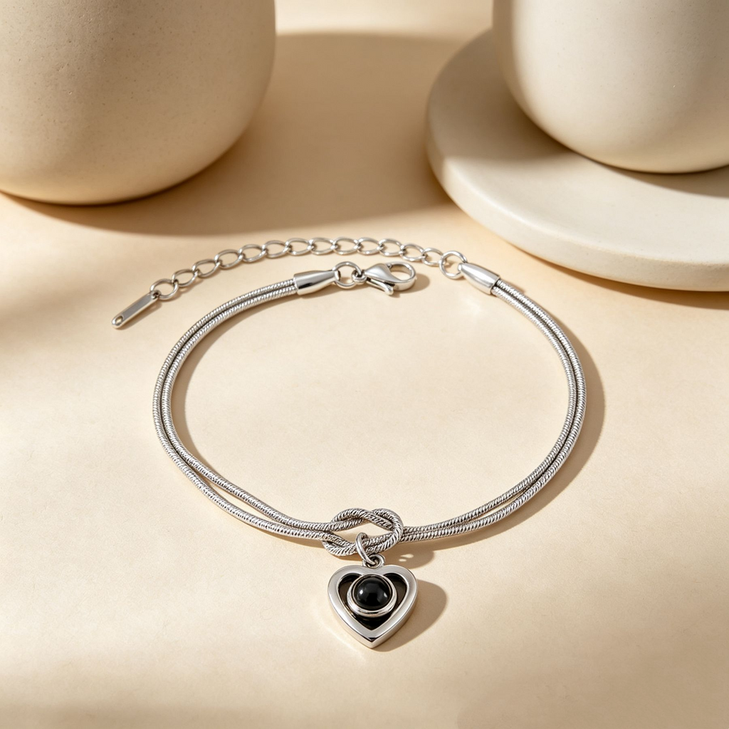 Silver infinity knot heart projection bracelet