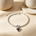 Silver infinity knot heart projection bracelet