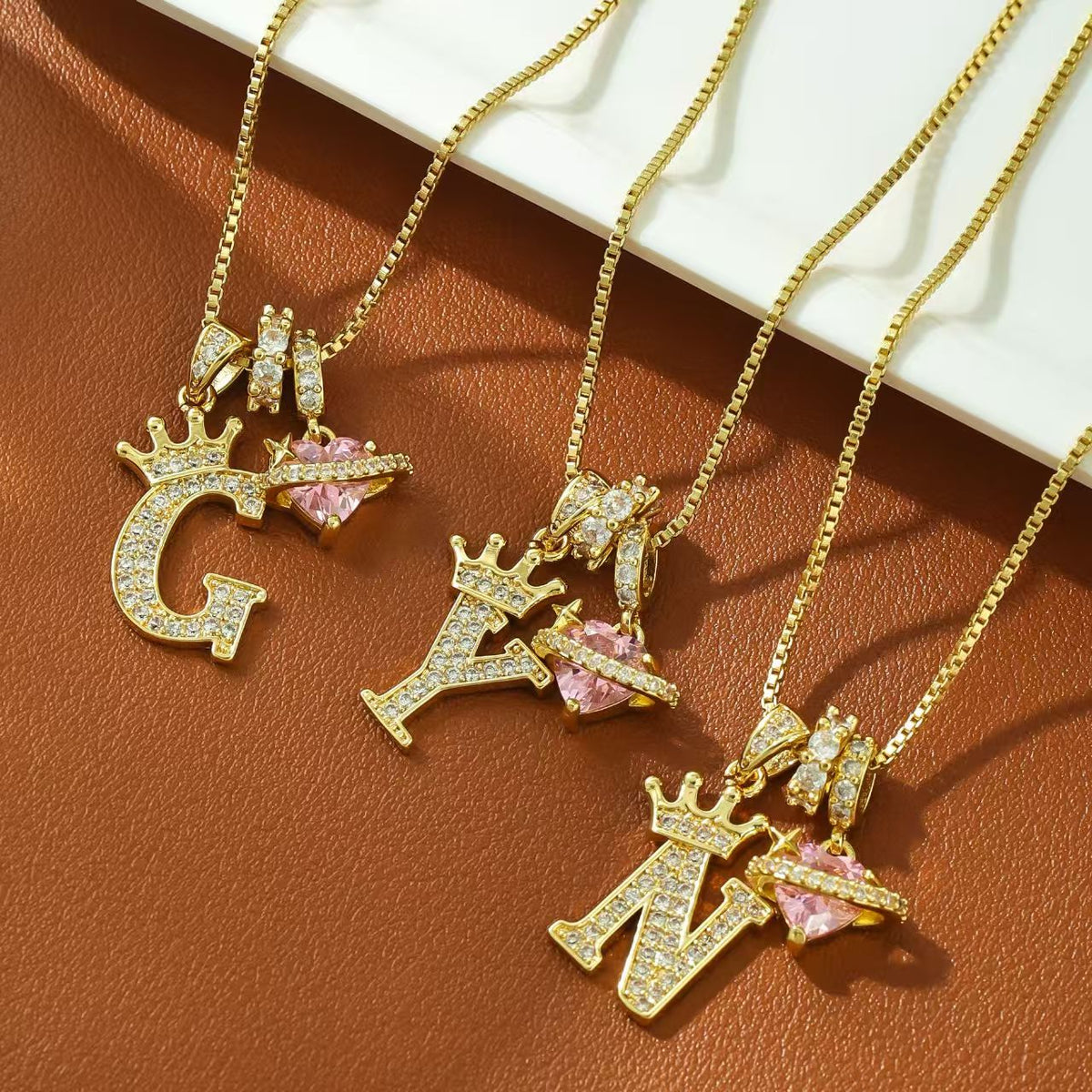 Gold letter pendants