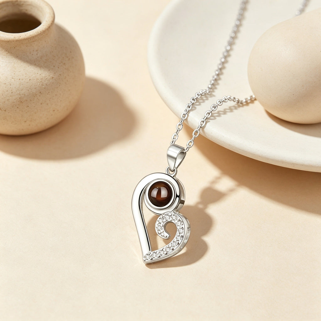 Matching black and silver couple necklace representing love connection