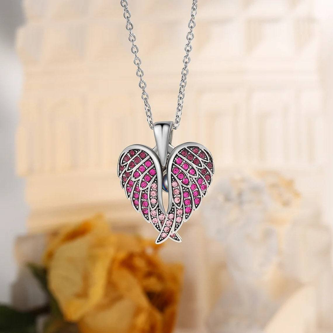 Phone camera view showing hidden photo inside projection necklace