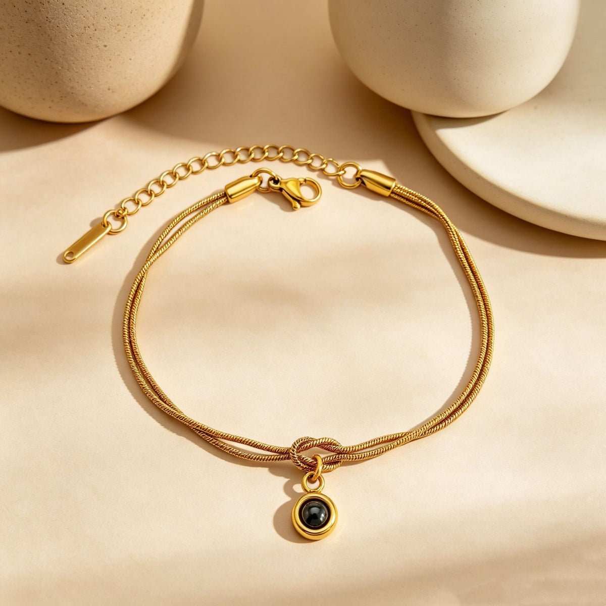Gold minimalist knot projection bracelet