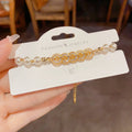 14K gold plated pearl bracelet with zircon charms