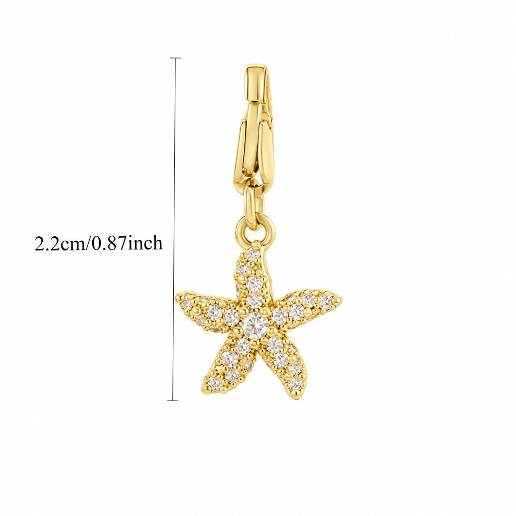 Star zircon charm on a stainless steel paperclip chain