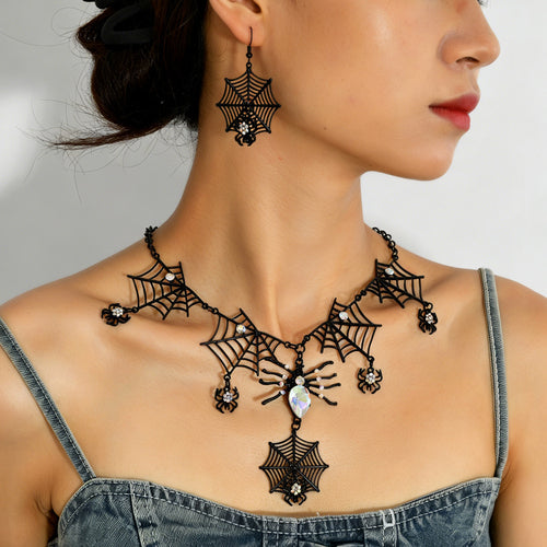 ThemodeliswearingaspidernecklaceandearringsetforHalloween.
