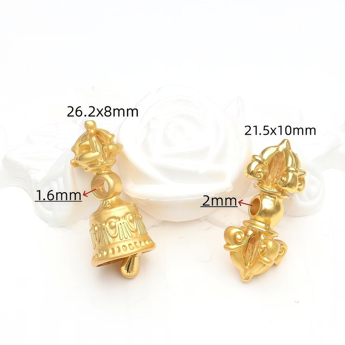 Gold vajra bell pendant with engraved detail